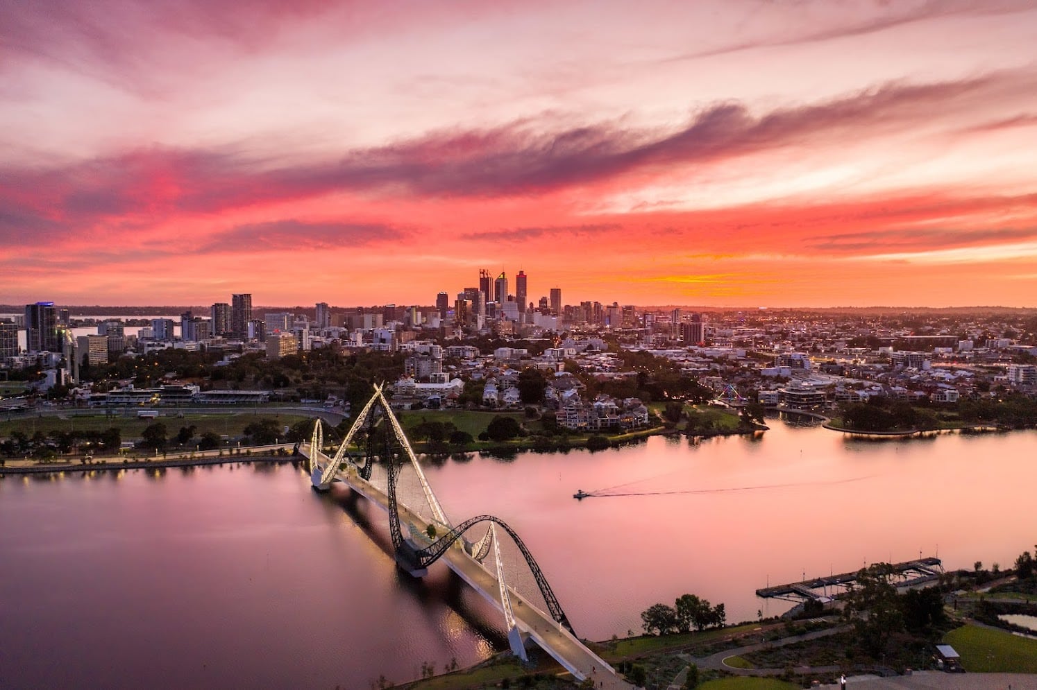 Aerial View of the sun rising above Matagarup Bridge, Perth