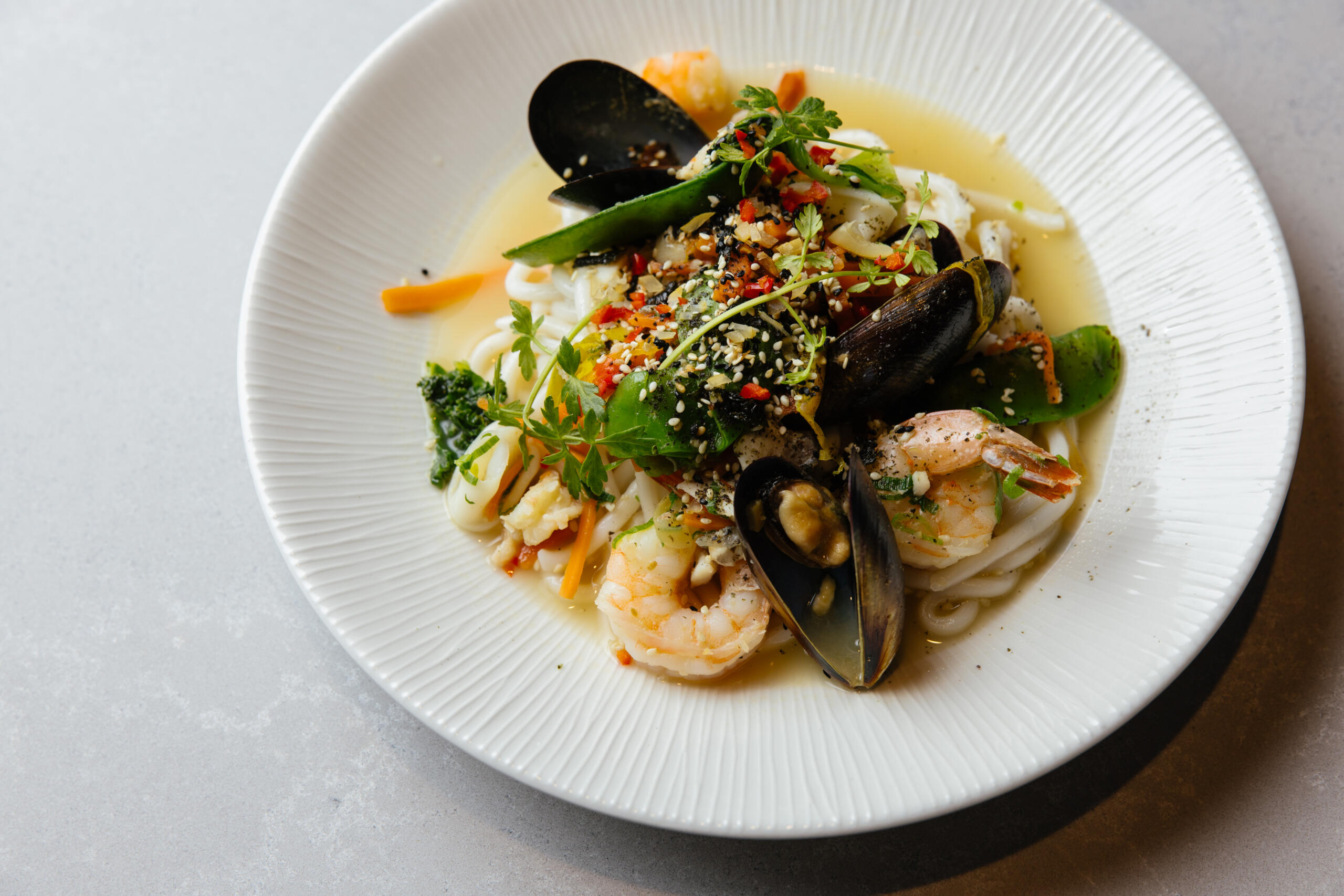 Main_Aromatic Local Seafood Pot with Udon Noodles 2_Plated Lunch Landscape