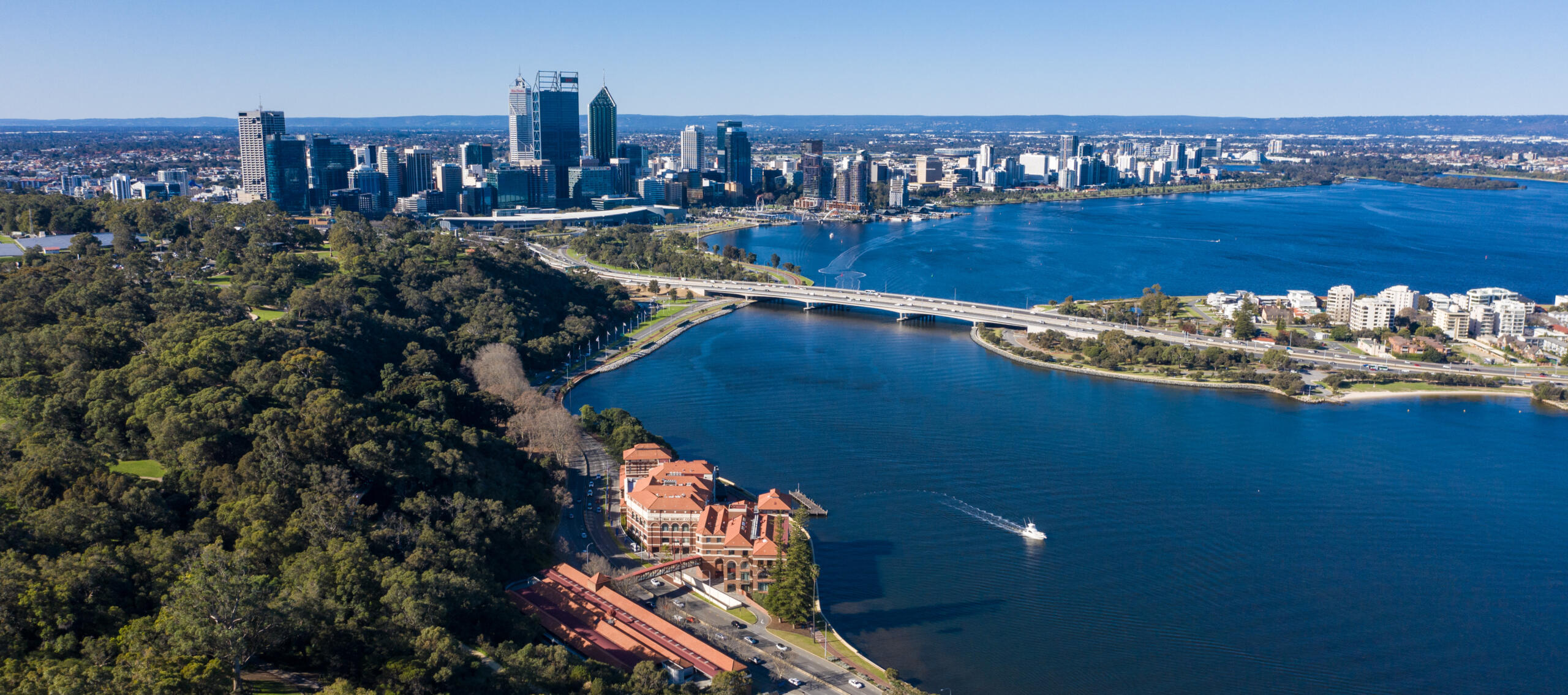 Aerial view of Kings Park and Botanic Garden with the Perth Skyline in the background.